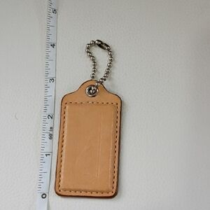 Coach Beige Leather Hangtag
